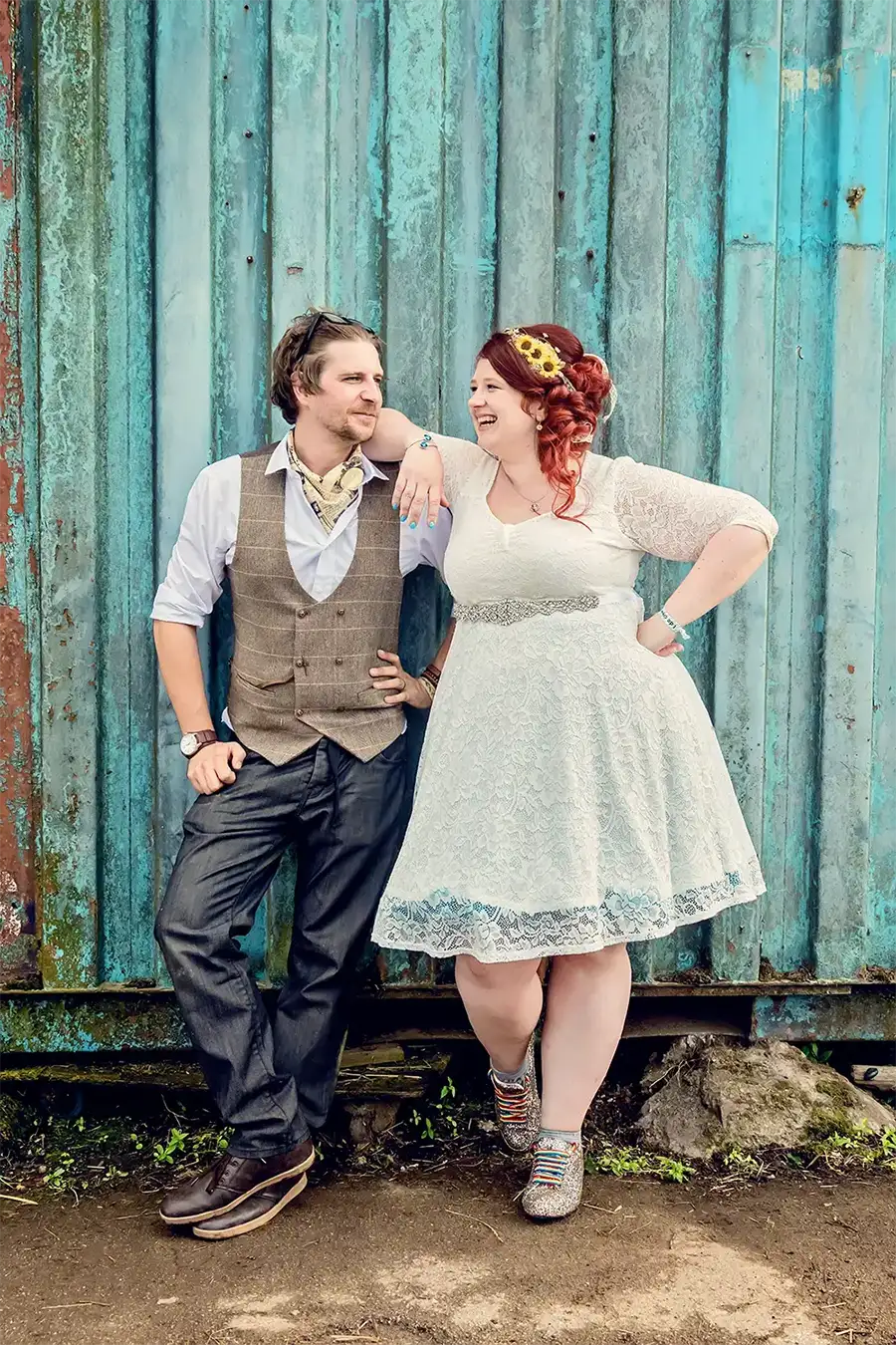 Bride and groom chilling outside a barn door in Worcester Bride and groom chilling outside a barn door in Worcester