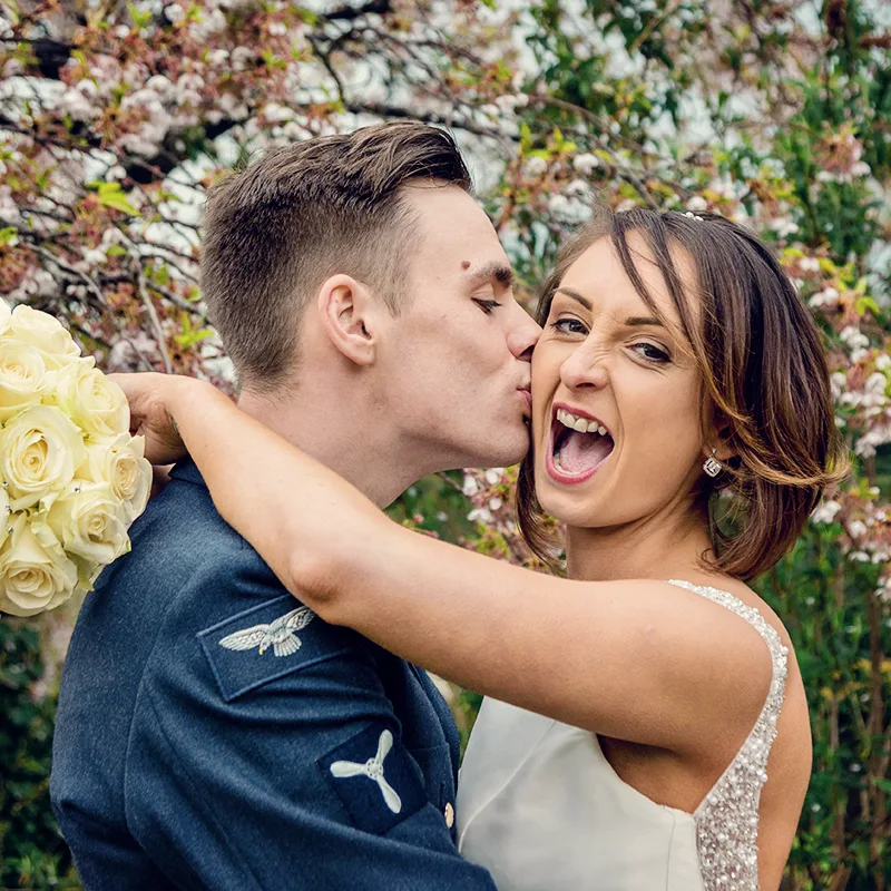 Newlyweds having fun outside Worcester cathedral Newlyweds having fun outside Worcester cathedral